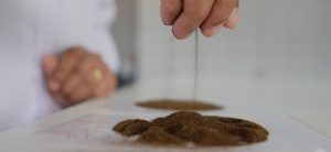 Hand mixing BOH tea leaves